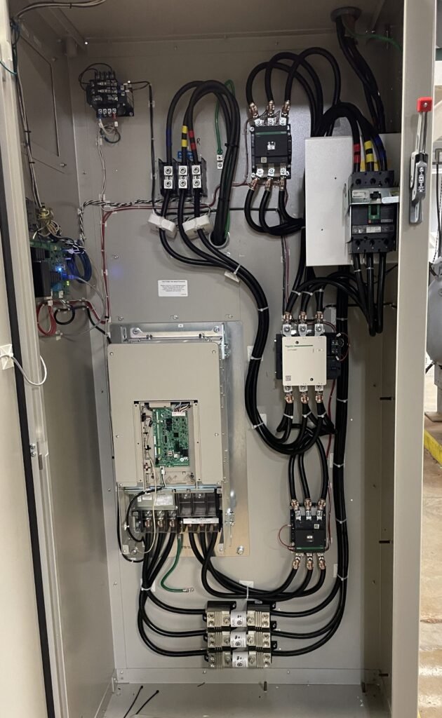 Yaskawa field service project upgrading variable frequency drives in the field.